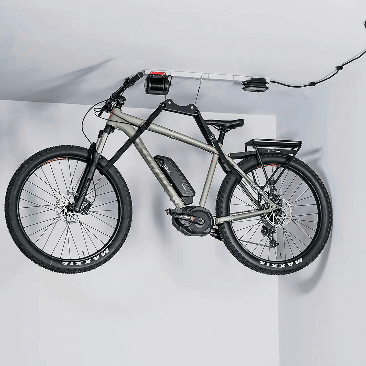 Ceiling-mounted bike storage system showcasing an organized mountain bike for space efficiency. 