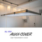 Auxx Lift semi-transparent cover accessory hanging in a modern indoor setting.