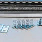 Auxx Lift platform rotation hardware kit components, including plates, springs, and bolts for installation.