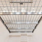 Auxx Lift motorized garage storage lift ceiling view, showcasing sturdy grid design for elevated storage solutions.