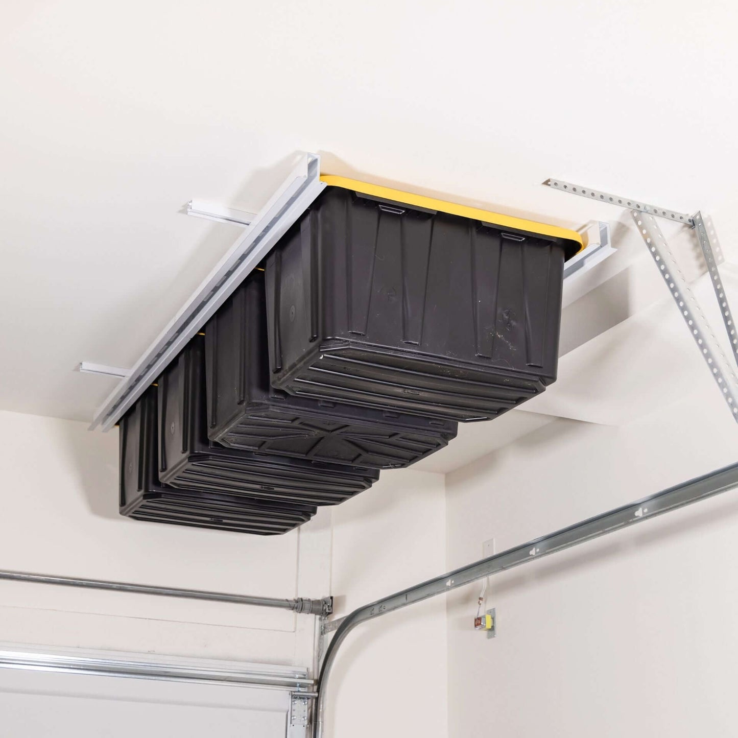 Ceiling Sam Tote Slide Garage Ceiling Storage - Adjustable showcasing organized totes on garage ceiling.