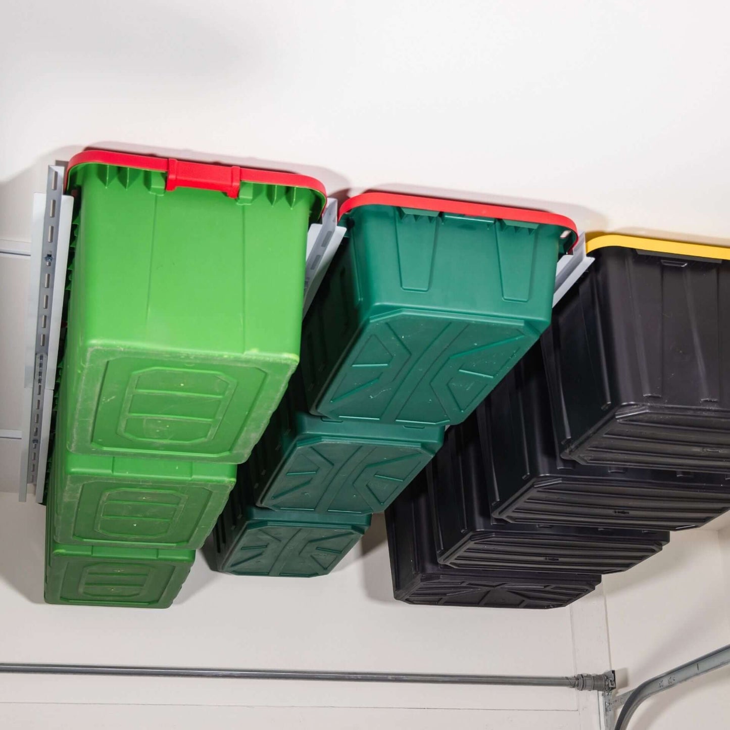 Ceiling Sam Tote Slide Pro Garage Ceiling Storage - Adjustable with organized totes in various colors.