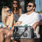 Group enjoying summer fun with Cool Boss Coolee CL-240 air cooler and Bluetooth speaker outdoors.