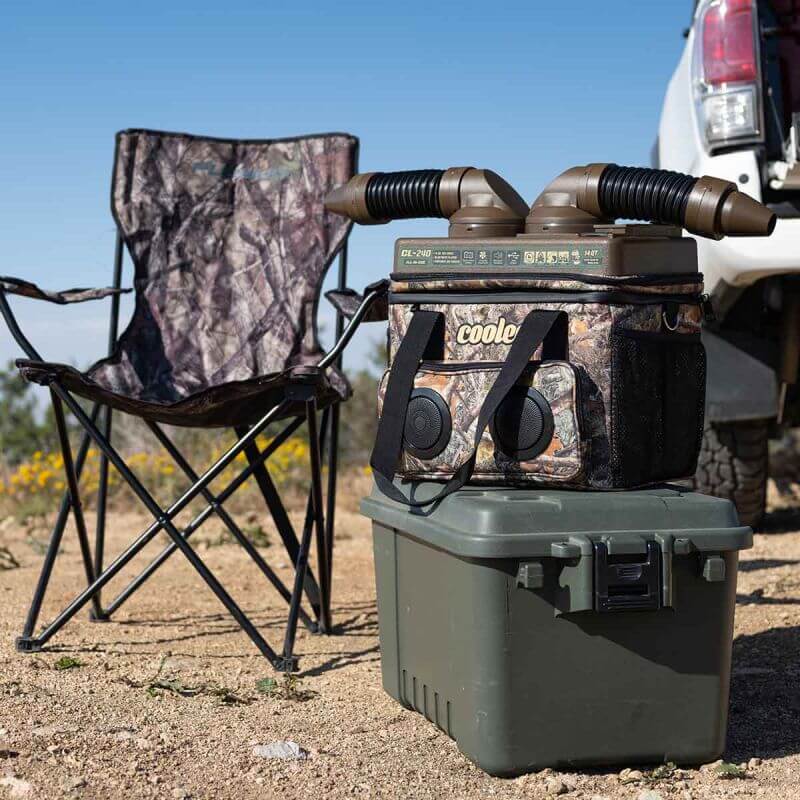 Cool Boss CL-240 Coolee 3-in-1 device next to a camping chair, ideal for outdoor activities.