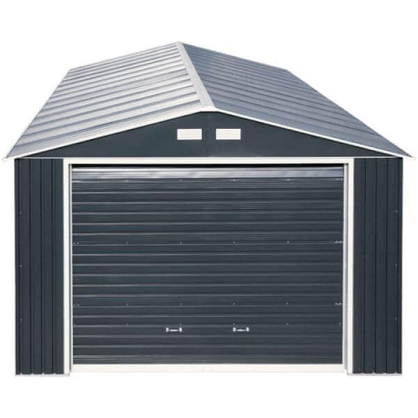 Duramax 12x26 Imperial Metal Garage in dark gray with white trim, featuring a roll-up door and a sloped roof.