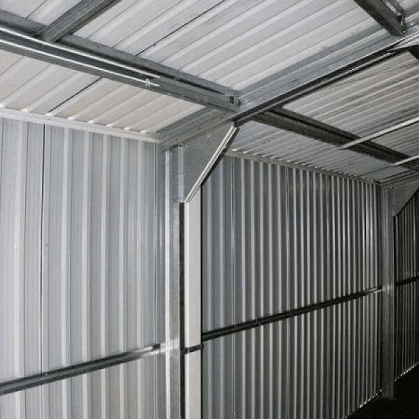 Interior view of a Duramax metal garage showcasing sturdy steel walls and ceiling.