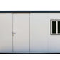 Duramax 13x10 flat roof insulated building with door and window, ideal for outdoor storage and workspace.