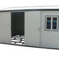 Duramax 13x10 gable roof insulated building with an open door and window, perfect for storage or workspace.