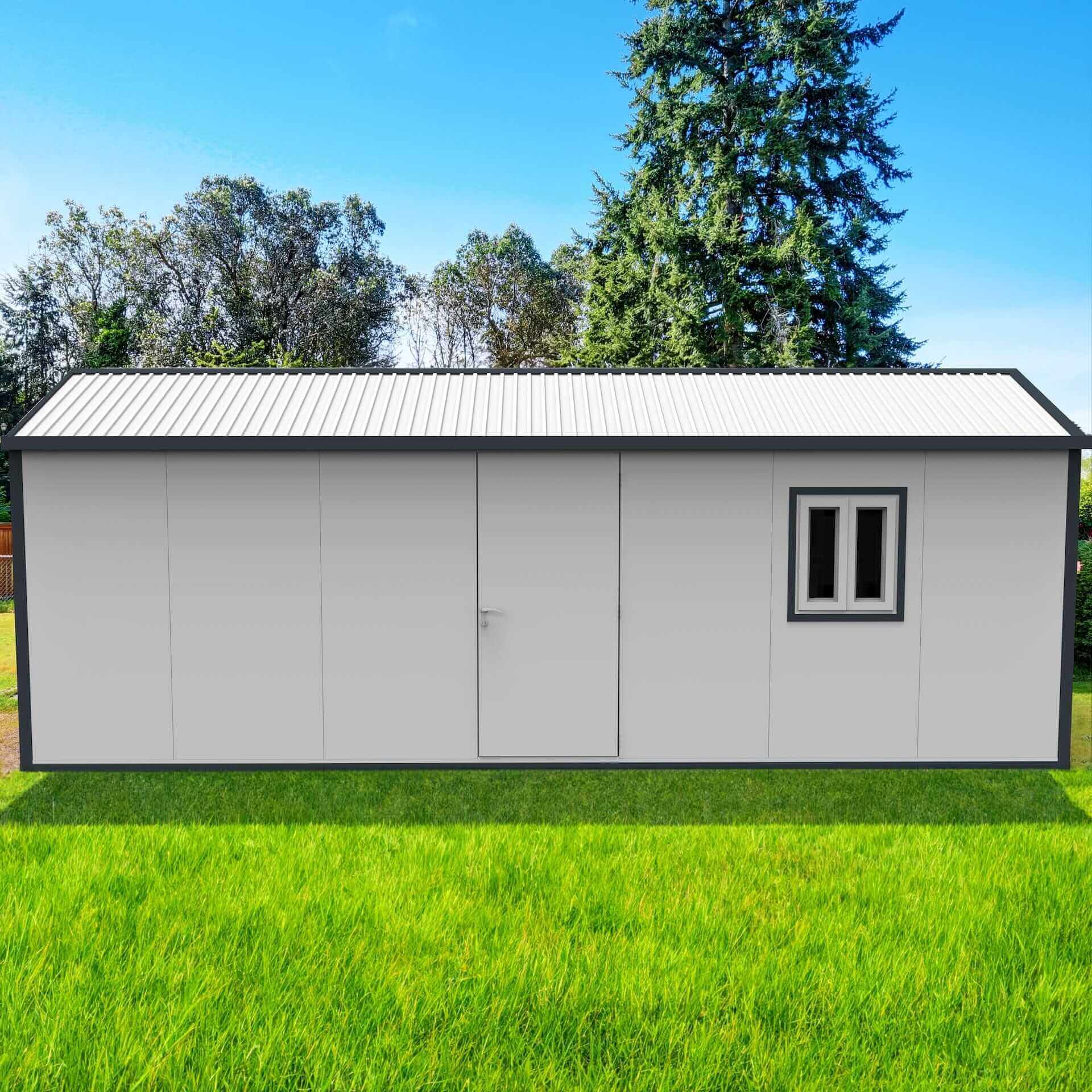 Duramax 22x10 gable roof insulated building in a grassy area with trees, ideal for storage or workspace.