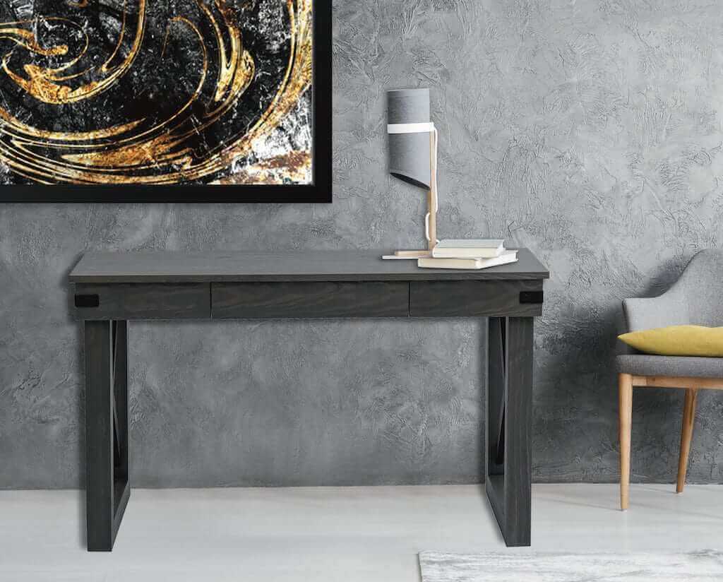 Duramax 48 In Felix Wood Desk with Drawer 68040 in modern home setting against textured gray wall, stylish lamp and artwork.