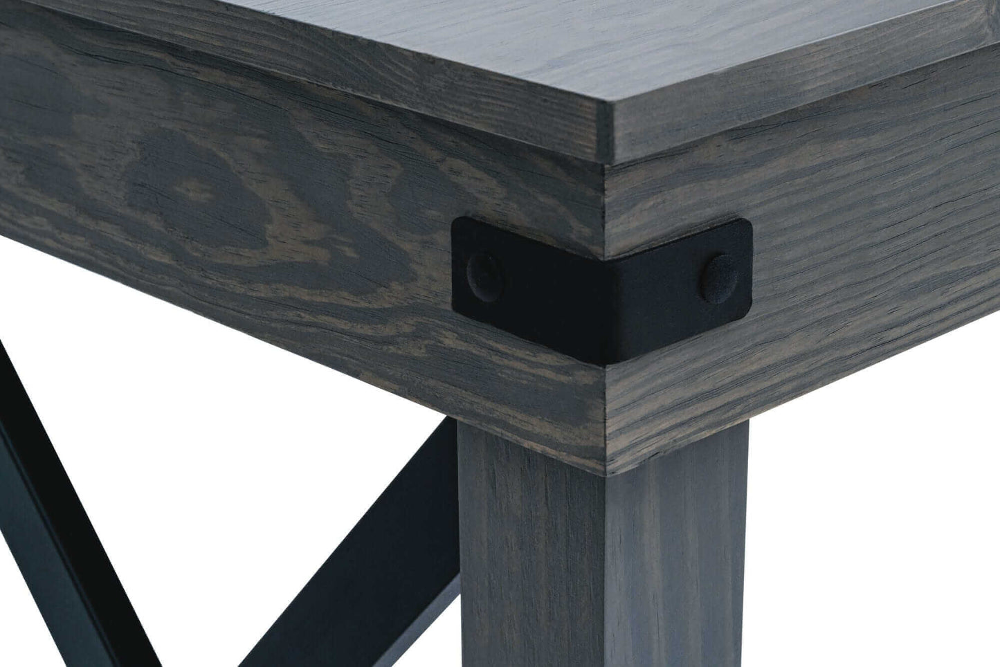 Close-up of Duramax 48 In Felix Wood Desk corner showing sleek design and metal bracket detail.