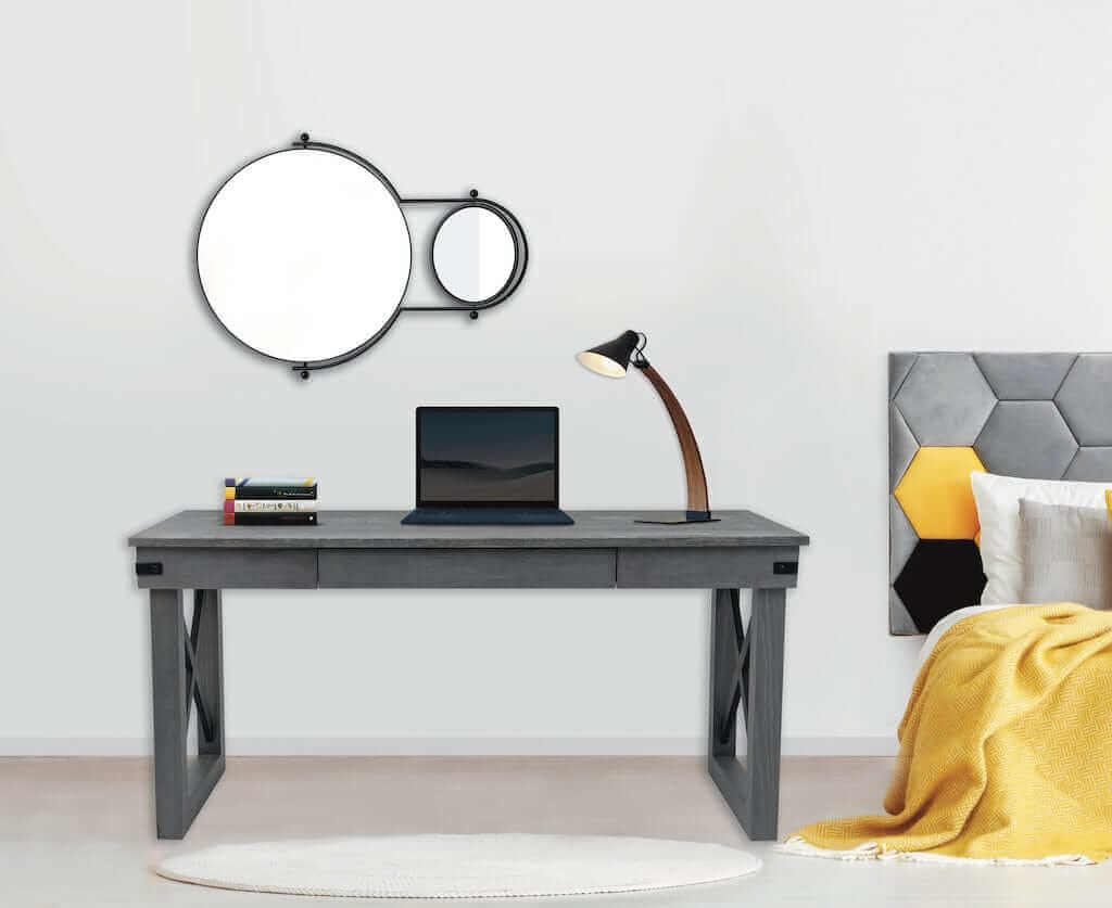 Duramax 62 Inch Felix Wood Desk in a stylish room setup with a laptop, lamp, and modern mirrors.