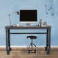 Duramax 62x24 inch rolling industrial worktable with a modern workspace setup, including a computer and desk lamp.