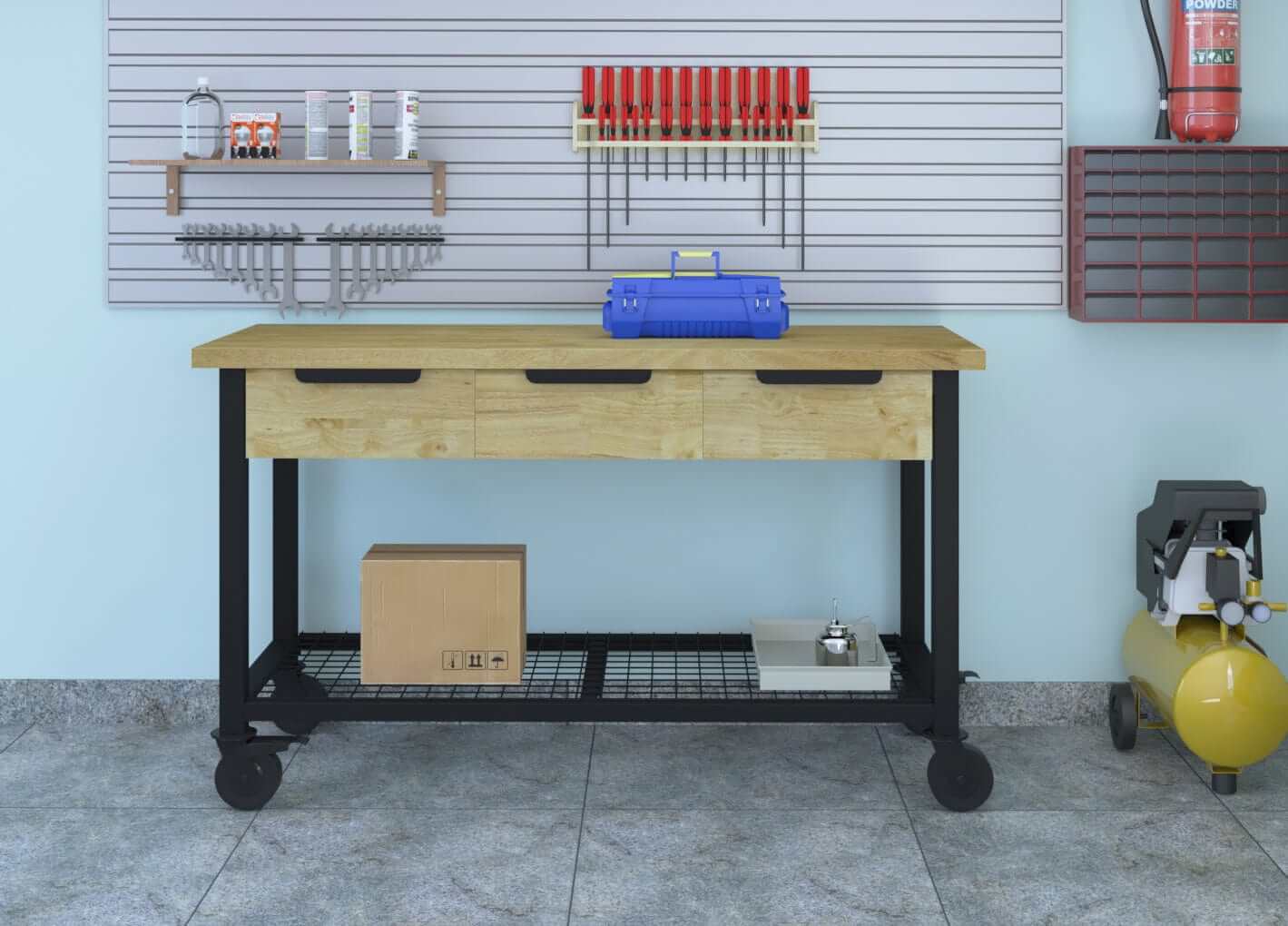 Duramax mobile workbench with 3 drawers on wheels, set against a garage wall with tools and storage.