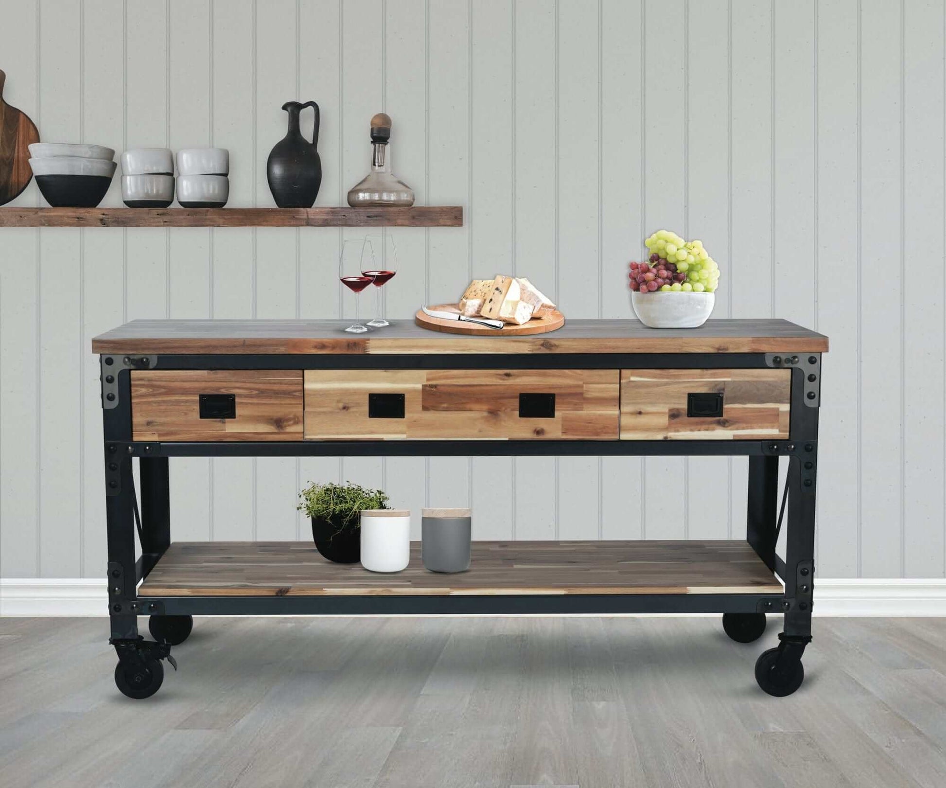 Duramax 72" Darby Industrial Metal & Wood kitchen island desk with drawers and lower shelf, styled with decorative items.