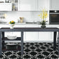 Duramax 72" Weston Industrial Desk with Shelves in modern kitchen setting, showcasing vibrant decor and spacious design.