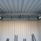 Interior view of the Duramax Bicycle Storage Shed showing metal structure and ventilation features.