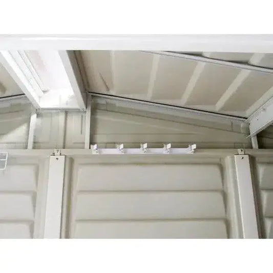 Duramax White Steel Multi-Tool Hanger mounted inside a shed, showcasing five metal spring-loaded clasps for tool organization. 