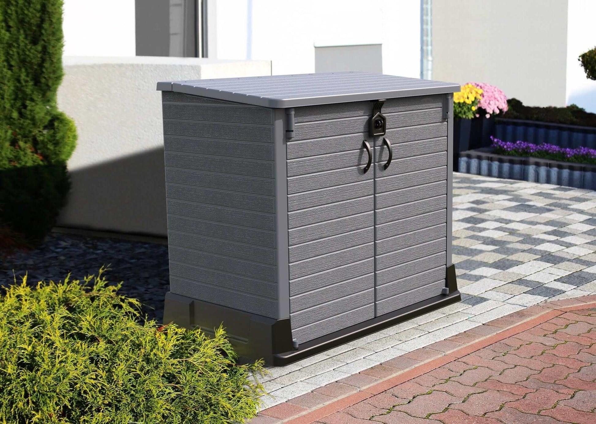 Duramax Storeaway 850L gray storage shed in outdoor setting, ideal for organizing garden tools and equipment.