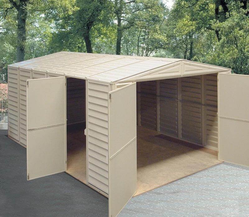 Duramax vinyl garage 10.5 x 15 with foundation, featuring spacious design and open doors.