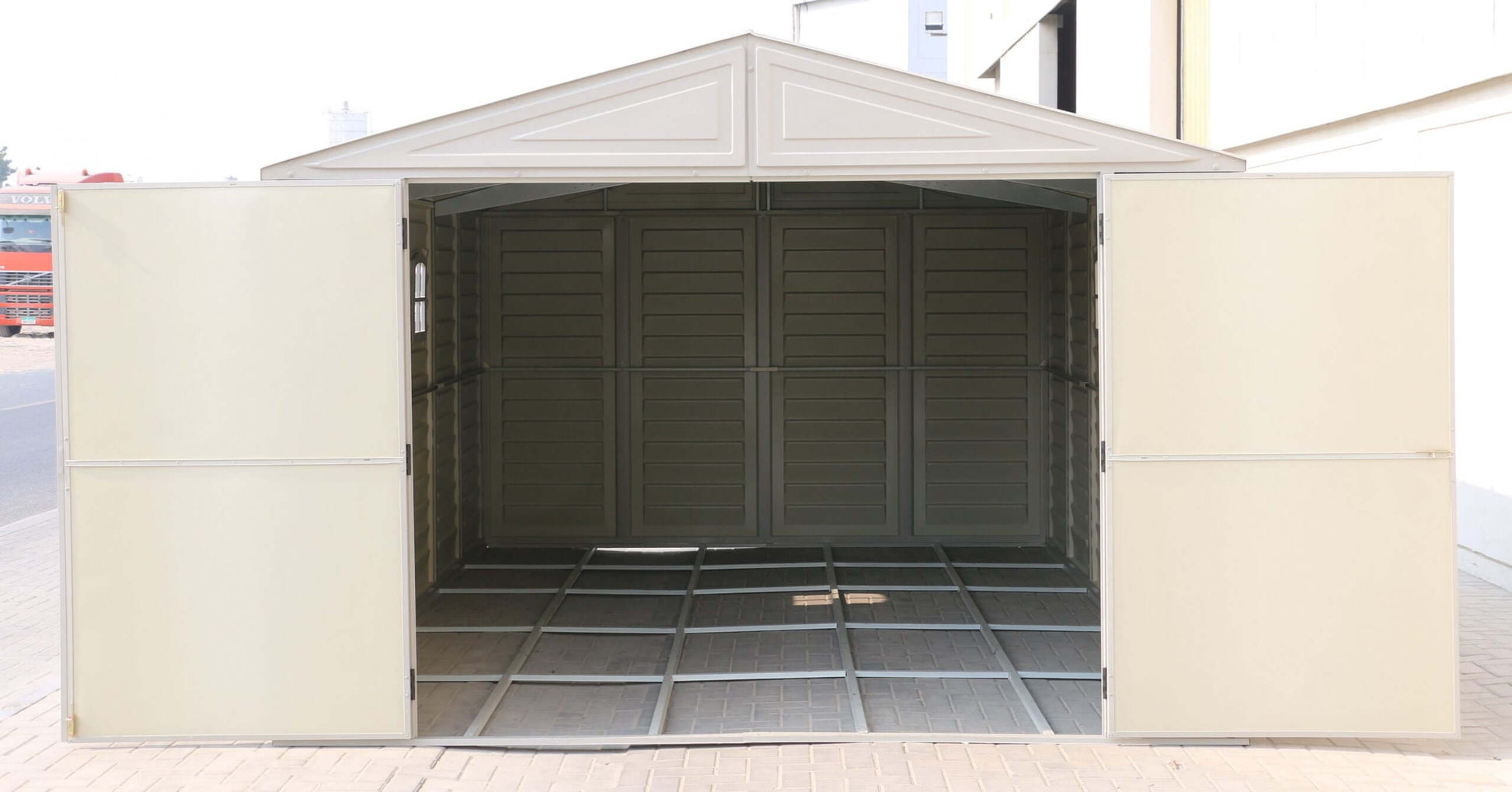 Duramax Vinyl Garage 10.5 x 15 with foundation, spacious interior and durable design for storage solutions.