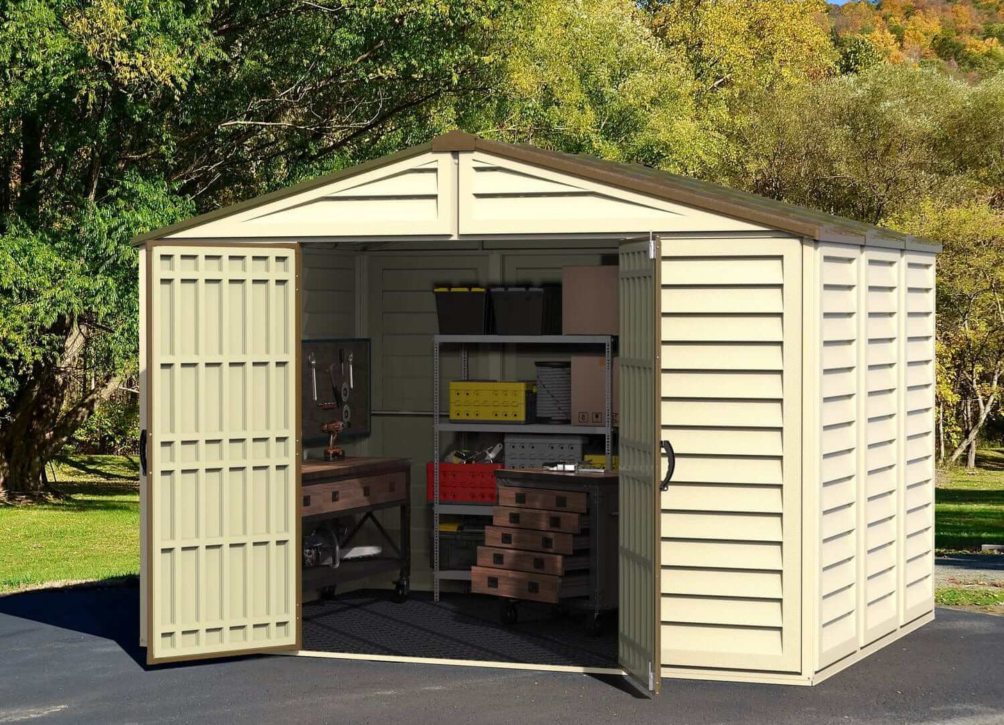 Duramax Vinyl Shed 10.5x8 Woodbridge Plus w/ Foundation showcasing storage space and work area.