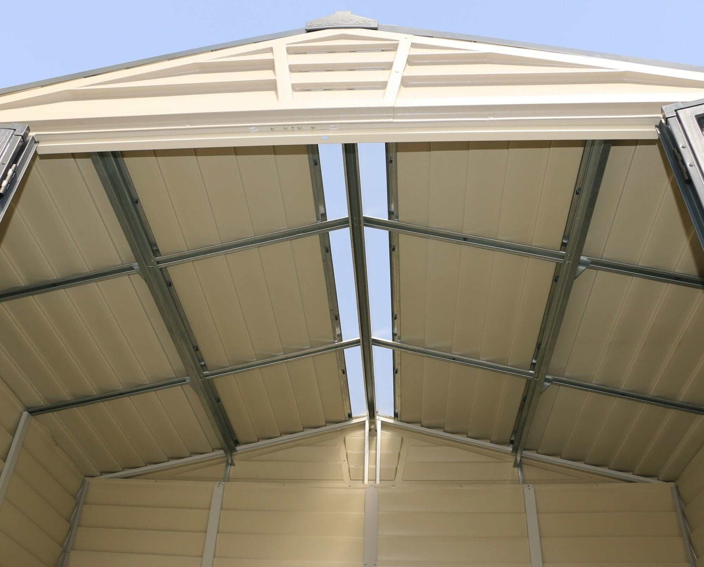 Interior view of the Duramax Vinyl Shed 10x8 StoreMax Plus, showcasing its sturdy roof structure.