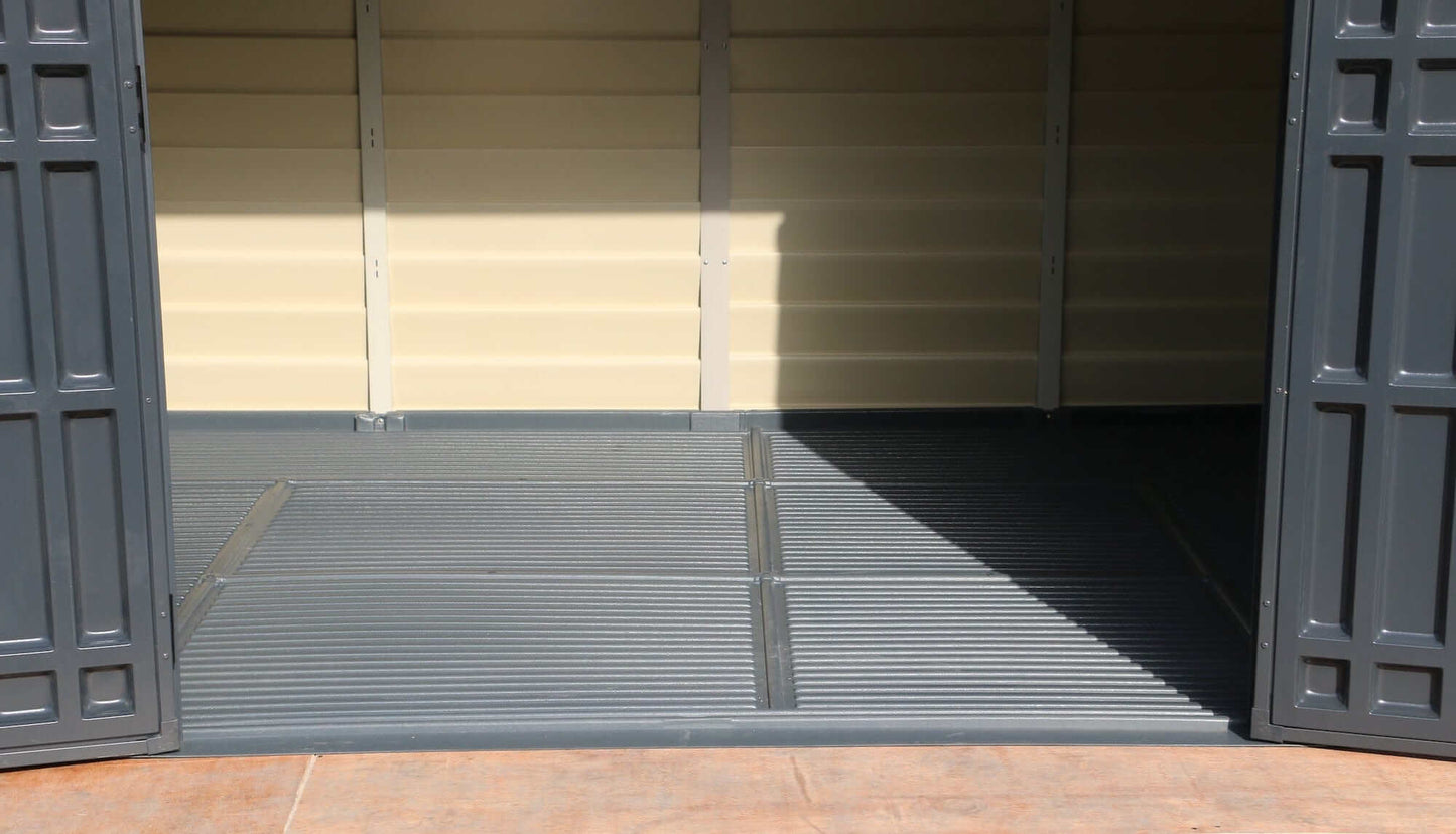 Interior view of Duramax 10x8 StoreMax Plus vinyl shed showing spacious floor.