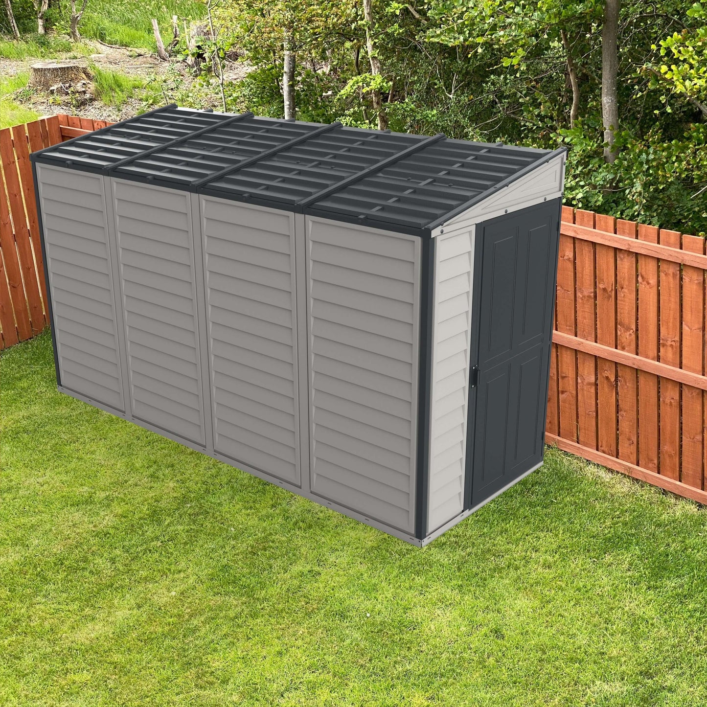 Duramax Vinyl Shed 4x10 SideMate Plus with foundation in a backyard setting against a wooden fence.