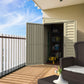 Duramax 4x8 SideMate vinyl shed with open doors on a balcony, showcasing spacious storage options.