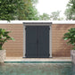 Duramax Vinyl Shed 5x3 YardMate with a stylish pent roof against a lush garden backdrop.