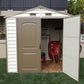 Duramax 8x6 StoreAll Vinyl Shed with open doors, showcasing interior storage space and shelves.