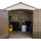 Duramax 8x8 DuraPlus vinyl shed interior view with open doors showing organized storage.