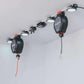 Garage Smart Smart Track system with motorized garage storage lift features and lights for organization.