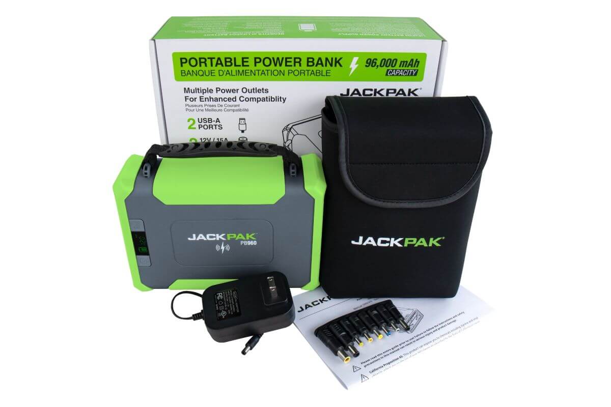 JackPak PB960 high-capacity power bank with charger and accessories, ideal for outdoor adventures.