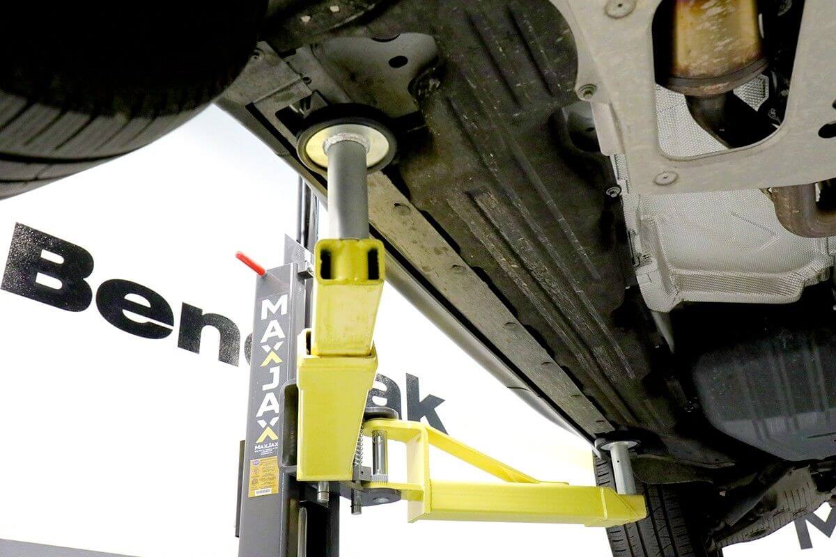 MaxJax M7K 2 Post Car Lift showing safety features and lift mechanisms for enhanced vehicle maintenance.