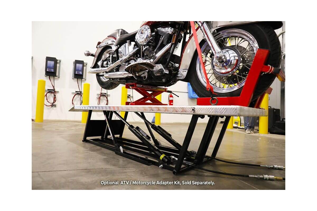 QuickJack portable car lift with motorcycle on it, showcasing 5,000 lb capacity and adjustable lift height.