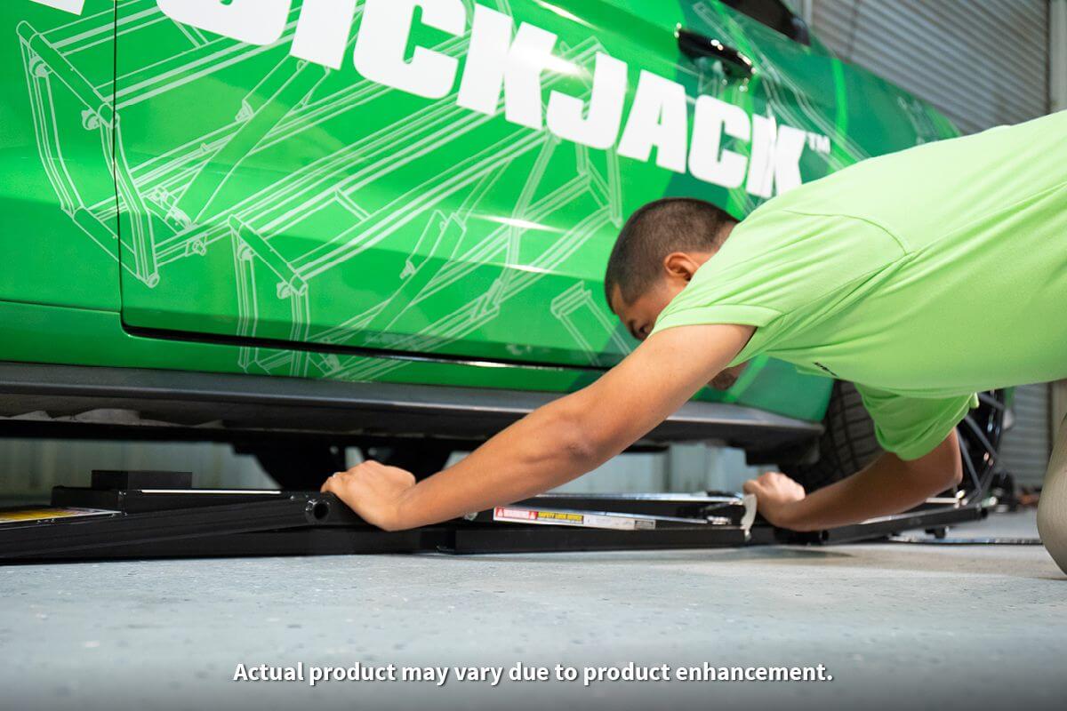 QuickJack 7000TL portable car lift in use, demonstrating lifting capability for trucks and SUVs.