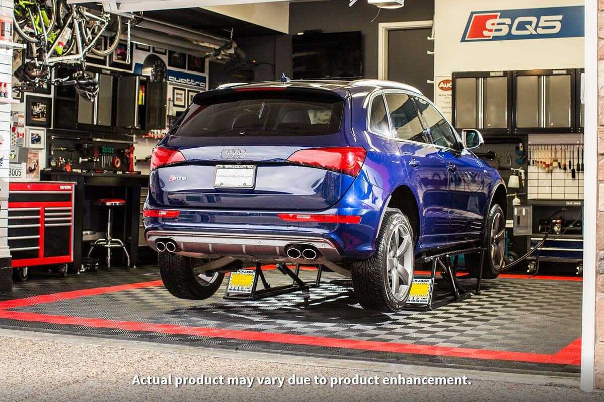 Blue Audi SQ5 on QuickJack 7000TL portable car lift in a garage setting.