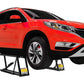 Honda SUV elevated on QuickJack 7000TL portable car lift, showcasing 7000 lb capacity and lifting height.