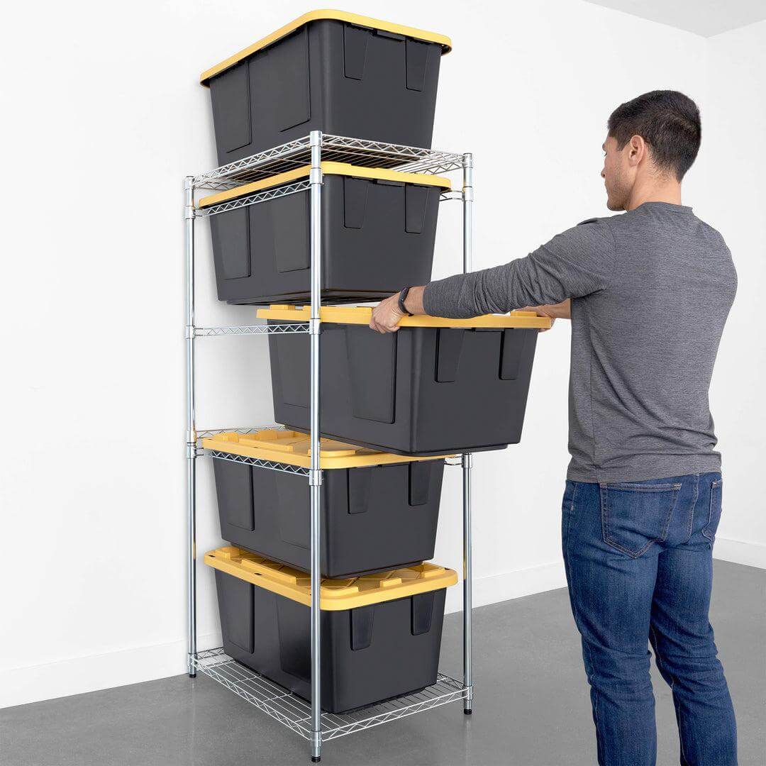 Person organizing storage bins on the SafeRacks storage bin rack combo for efficient space management.