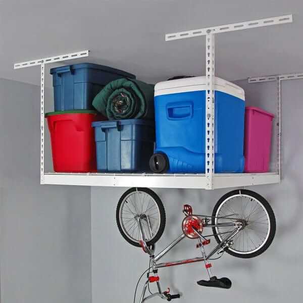 Overhead garage storage rack holding colorful bins and a bicycle, maximizing space and reducing clutter.