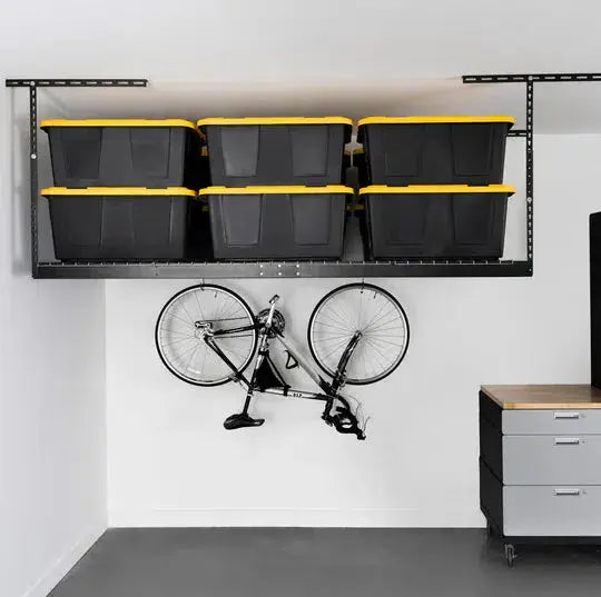 Overhead garage storage rack with yellow bins and a bicycle hanging below, showcasing efficient space utilization.