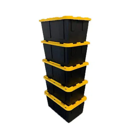 Stacked black storage bins with yellow lids for efficient garage organization.
