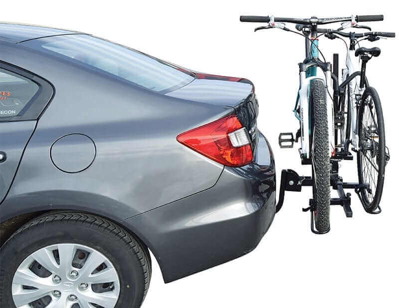 Motorized bike storage lift attached to a car, demonstrating easy overhead storage solutions for bikes.