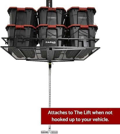 Motorized storage lift holding multiple totes, showcasing The Lift's convenient overhead storage solution.