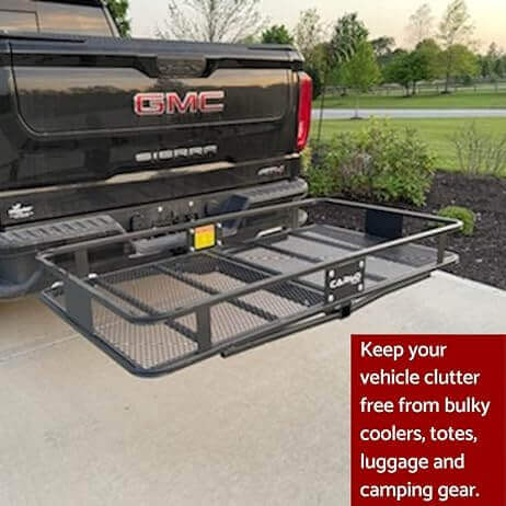 GMC Sierra with a hitch-mounted cargo carrier for organizing coolers, luggage, and camping gear.