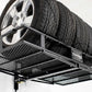 Motorized overhead storage lift with tires securely stored on a metal rack for easy access and organization.