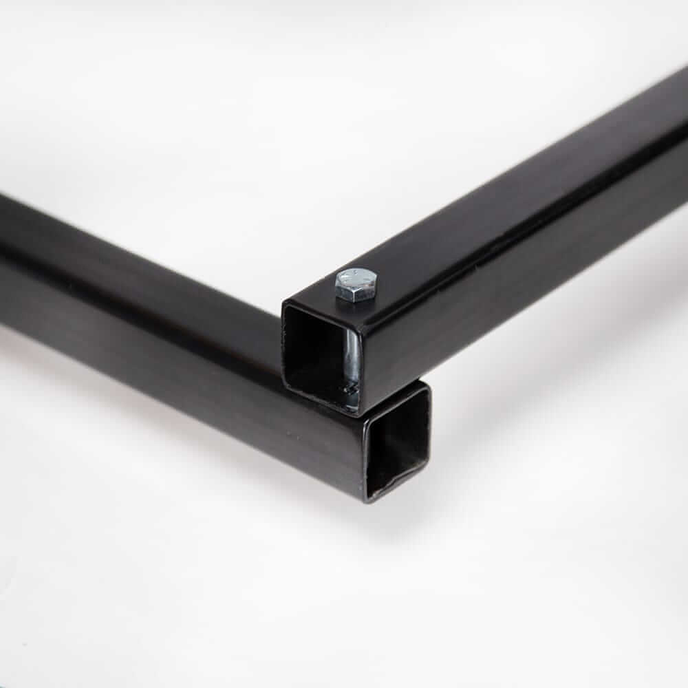 Close-up of the black metal frame connection in Top Shelf Storage Solutions for motorized overhead storage.