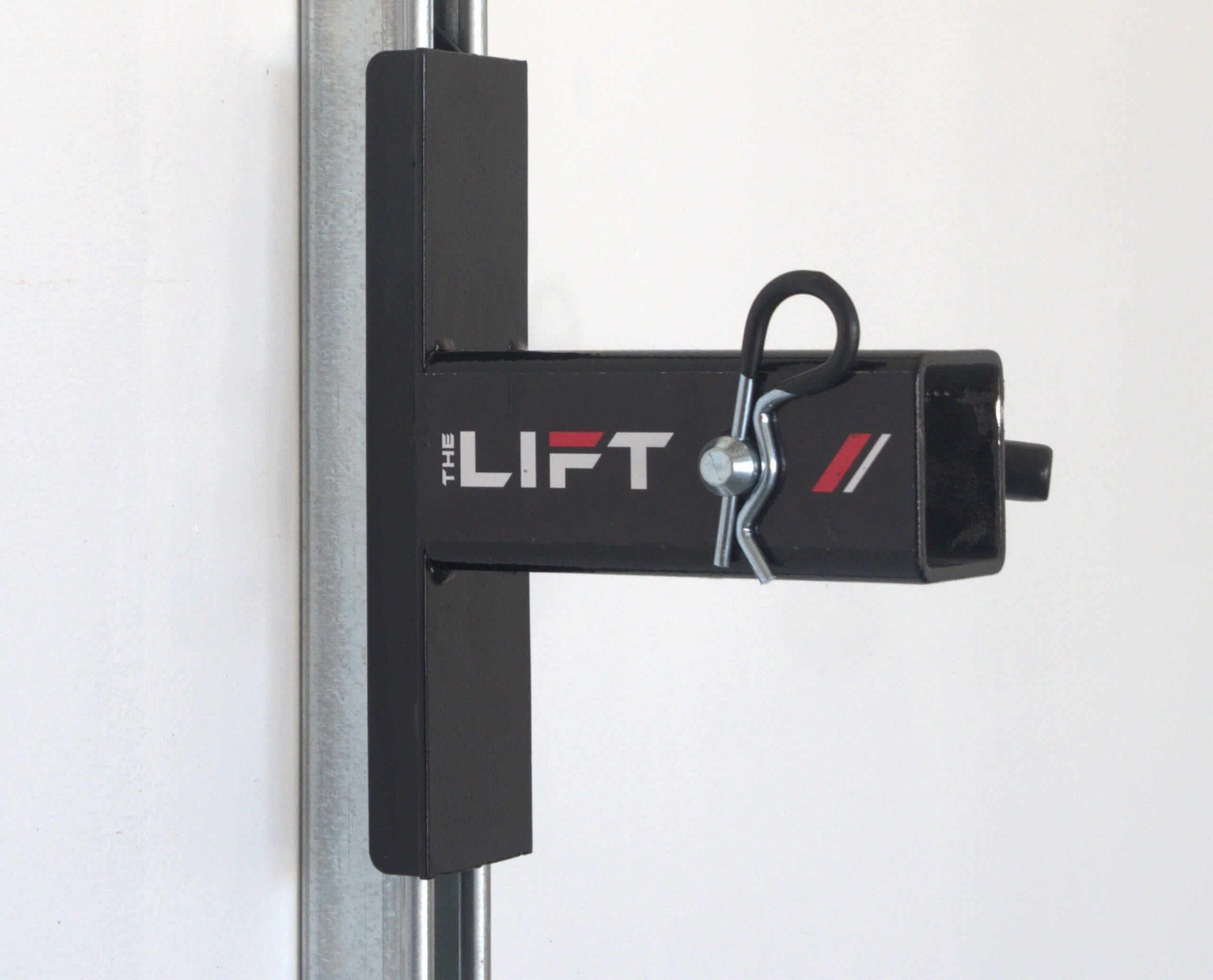 Close-up of The Lift motorized overhead storage system for easy garage organization.